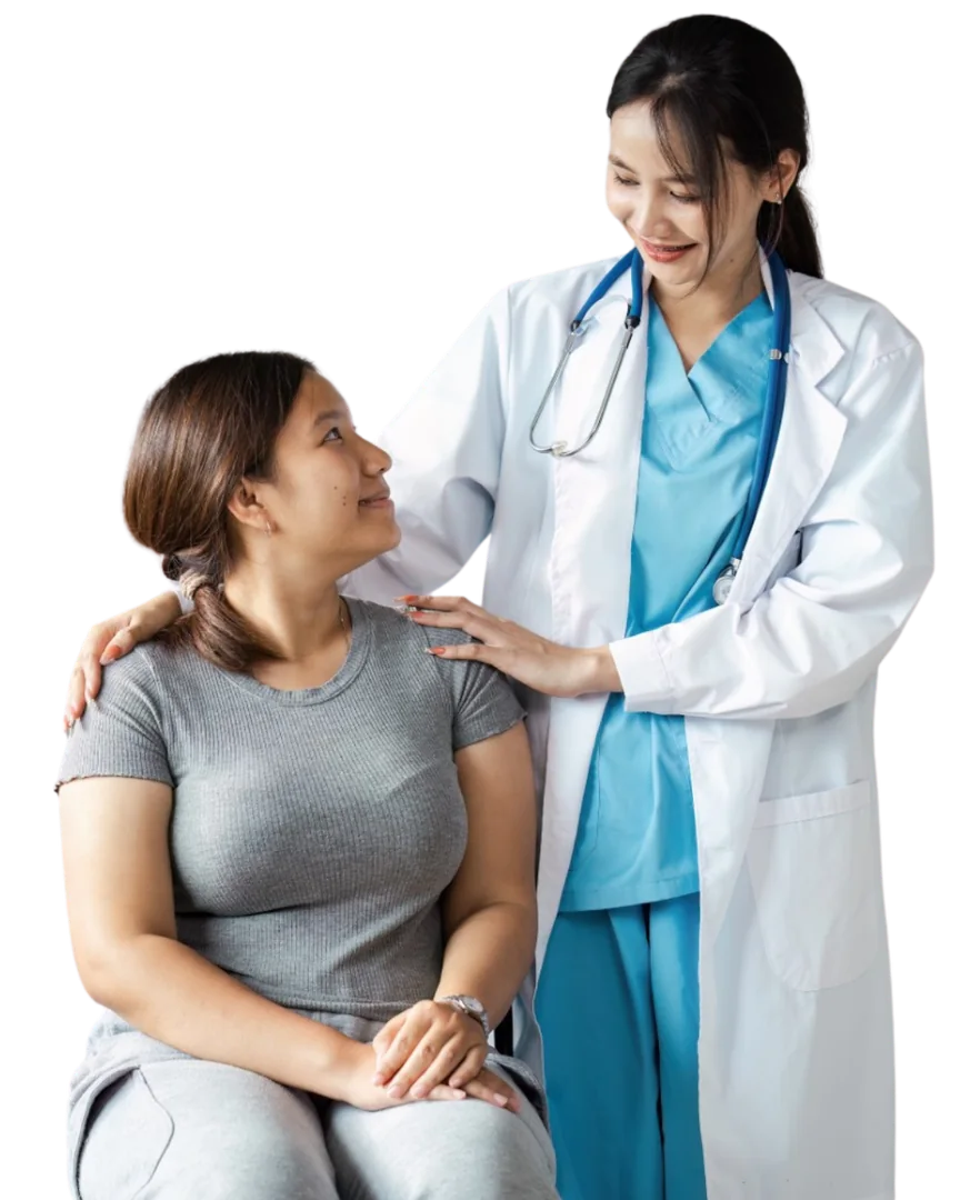 A Terrace Clinic doctor standing with a seated patient